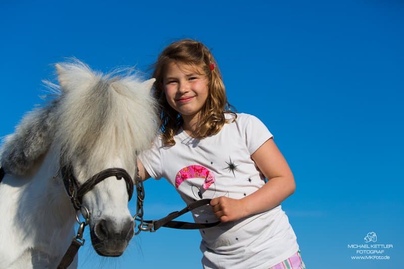 Fotoshooting mit Pferd am Strand